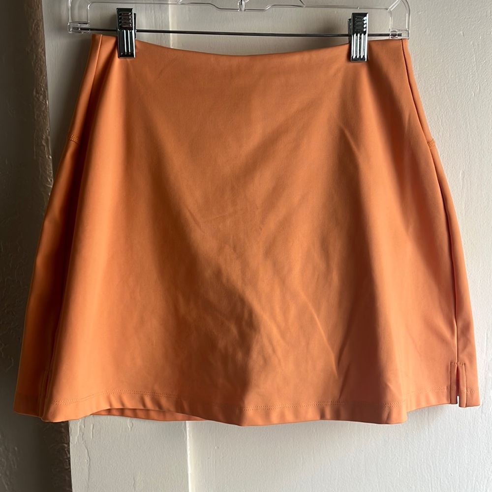 Girlfriend Collective skort (horizon orange)